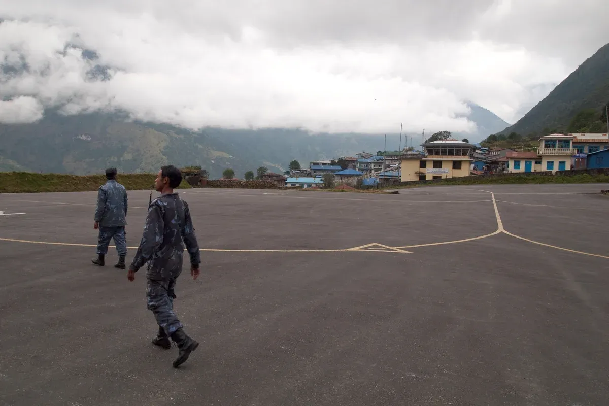 The runway at Tenzing-Hillary Airport in Lukla where Everest climbing tours begin the trek, Nepal